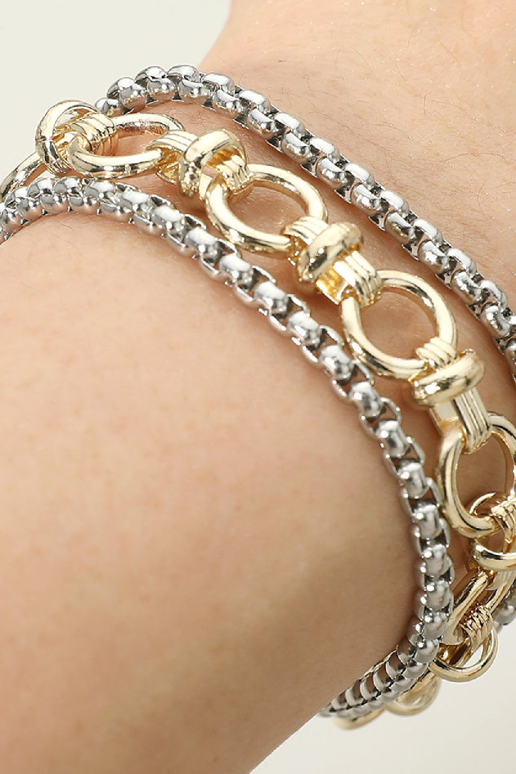 Two-tone gold and silver chain magnetic bracelet with round link clasp