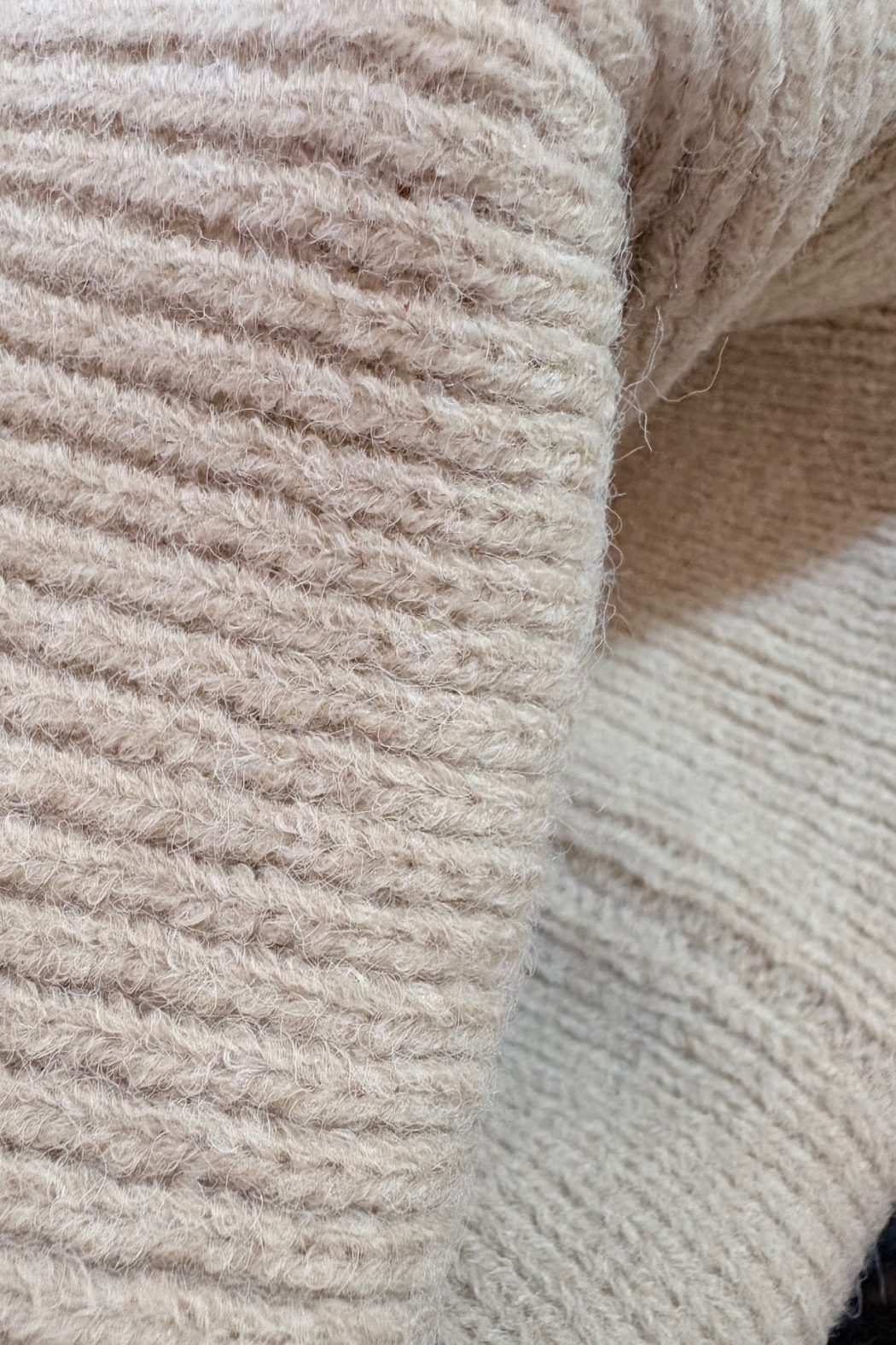 Beige knit cuffed beanie with ribbed texture