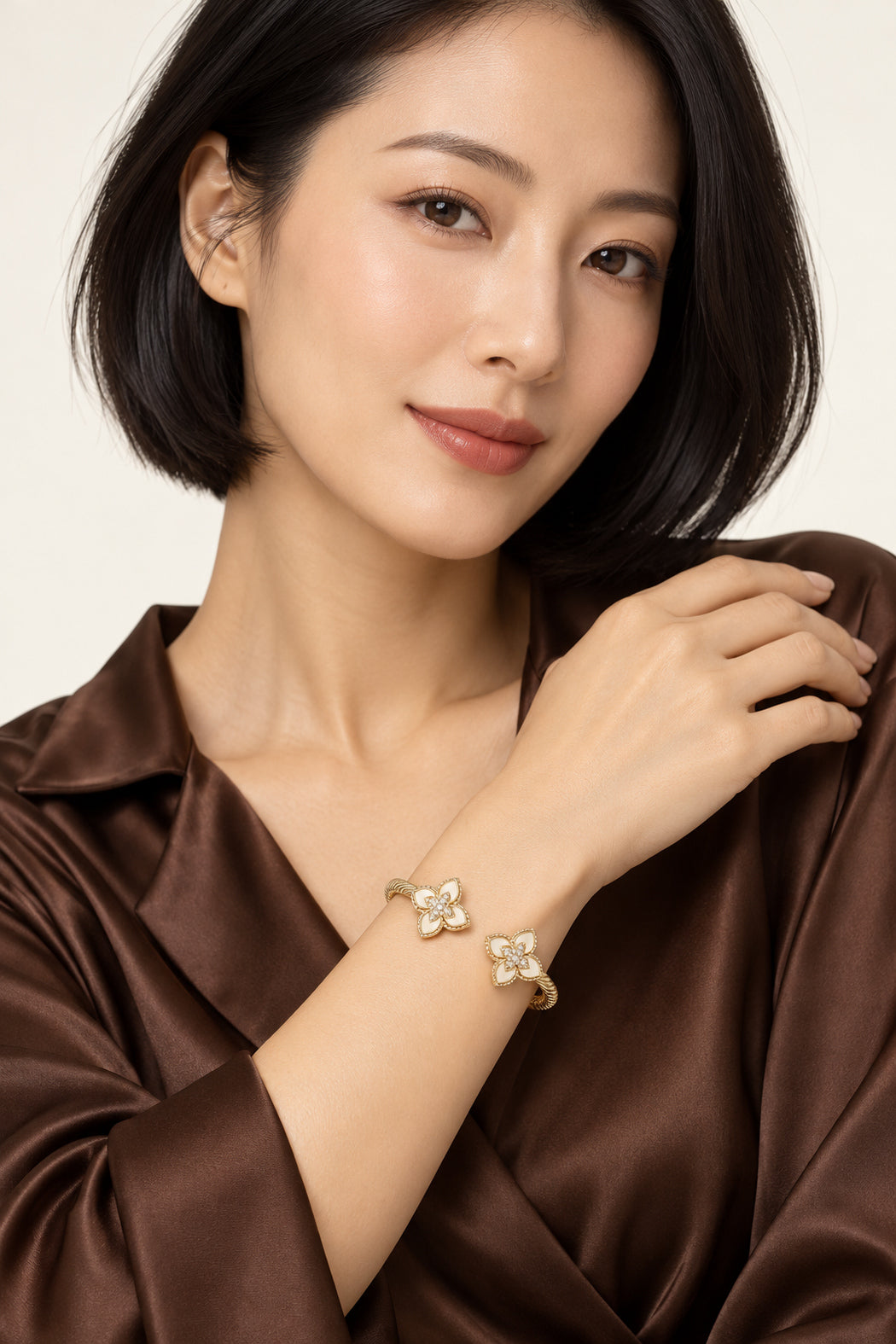 Gold-plated mother-of-pearl CZ cuff bracelet with floral clover motifs