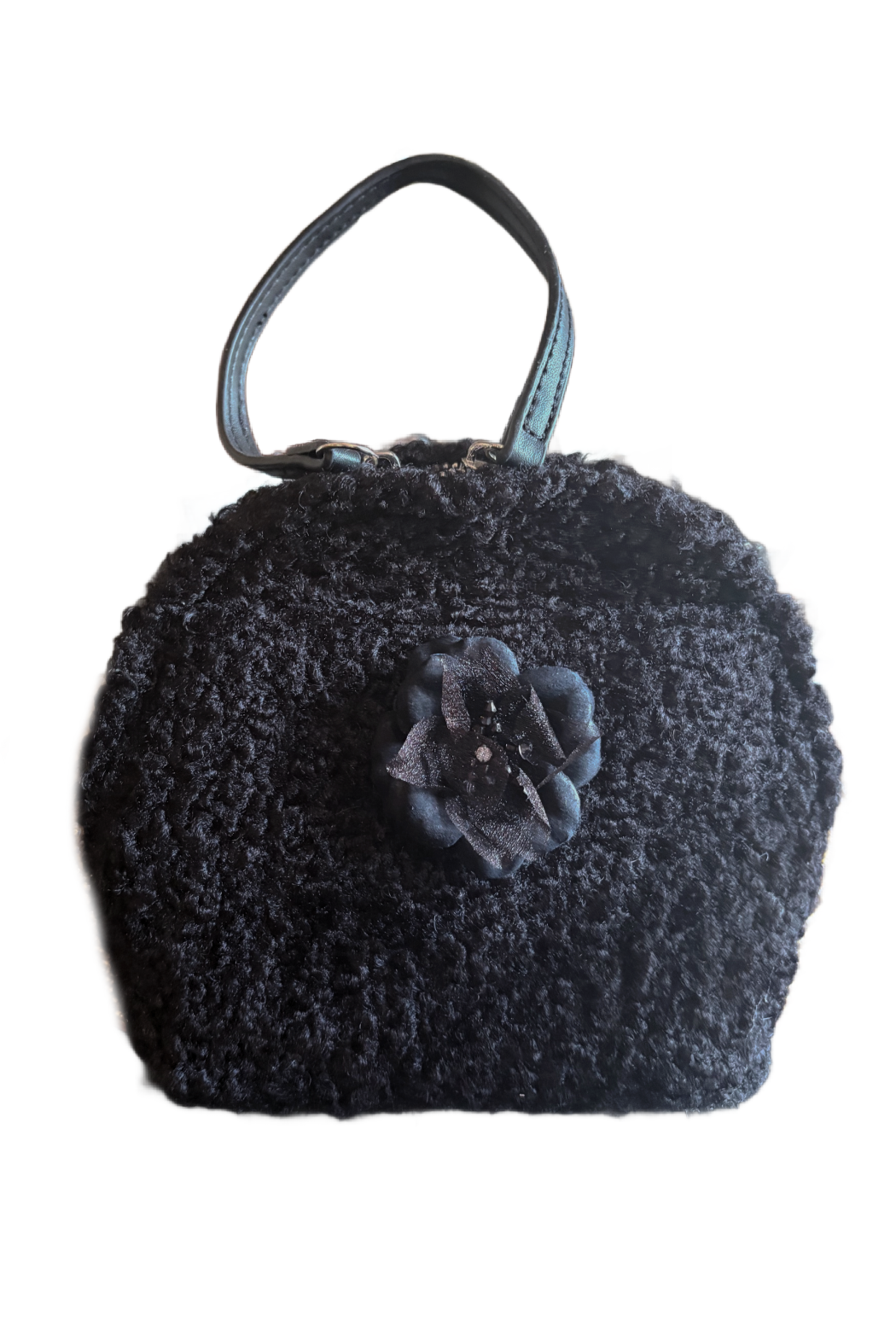 Black round boucle handbag with short handle and fabric flower accent