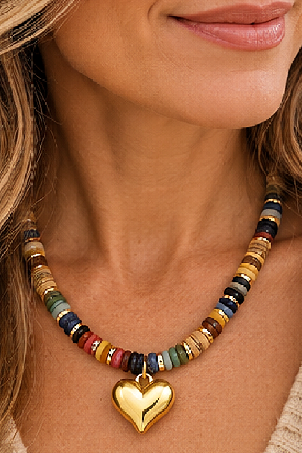 Multicolor bead heart pendant necklace worn at the collar