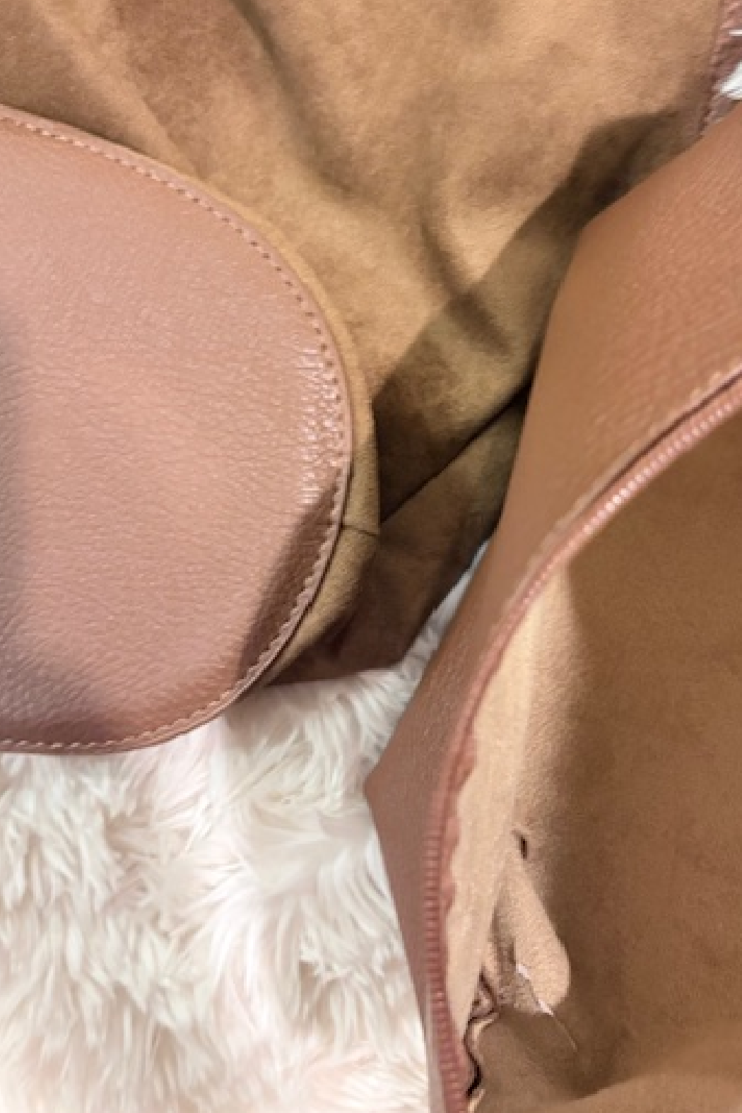 Suede slouchy shoulder bag interior with taupe leather pocket detail and stitched seams
