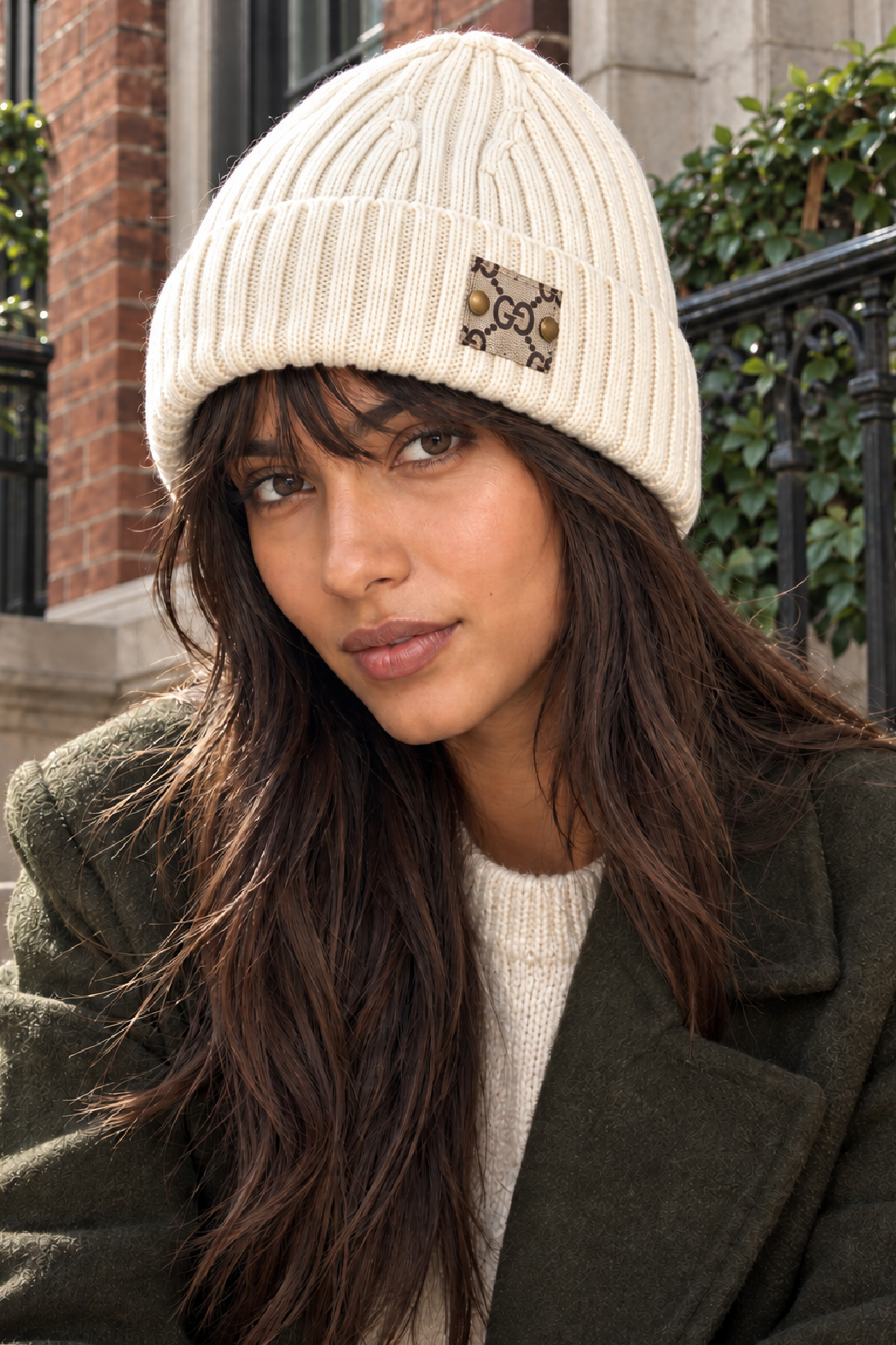 Upcycled Gucci beanie in cream ribbed knit with folded cuff and GG logo patch
