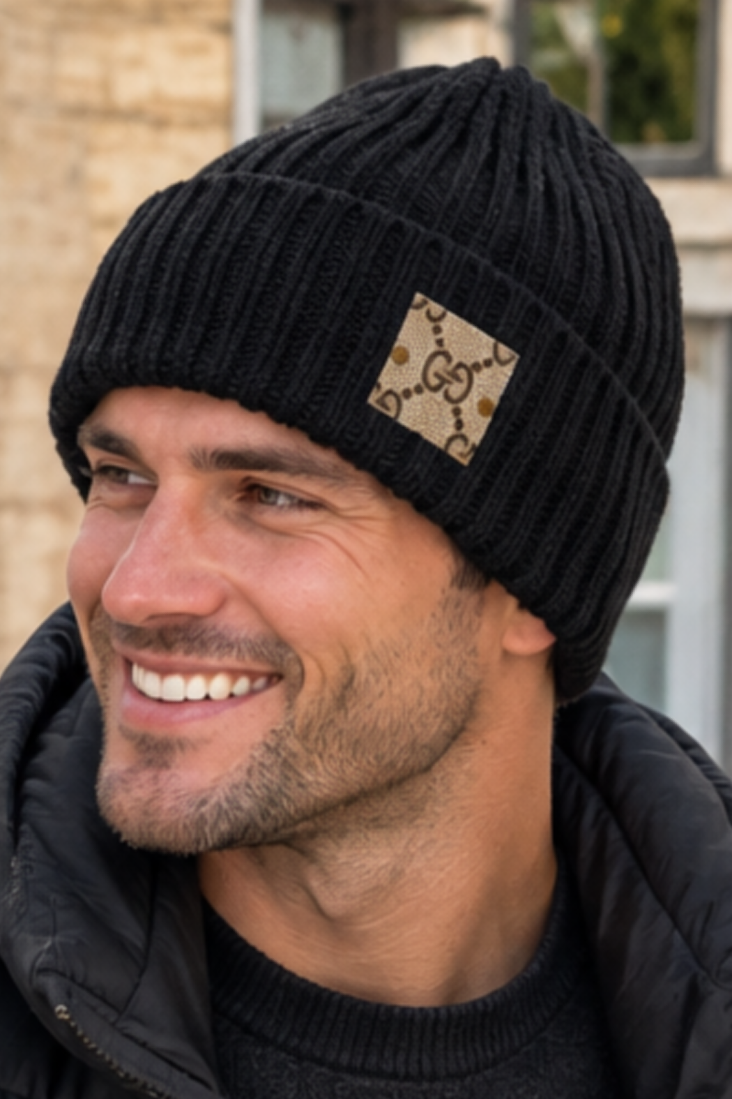 Upcycled Gucci beanie in black ribbed knit with cuff and GG logo patch detail